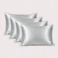 Quatre taies d'oreiller en soie Gris Perle